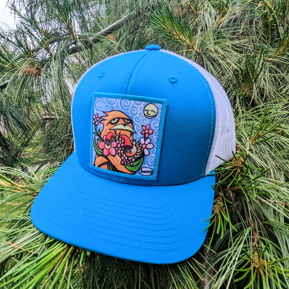 Sasquatch Hugging Flowers Trucker Hat